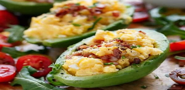 Scrambled Eggs and Crispy Bacon in Avocado